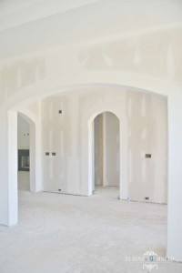 home construction dry way and arches in dining room and entry area