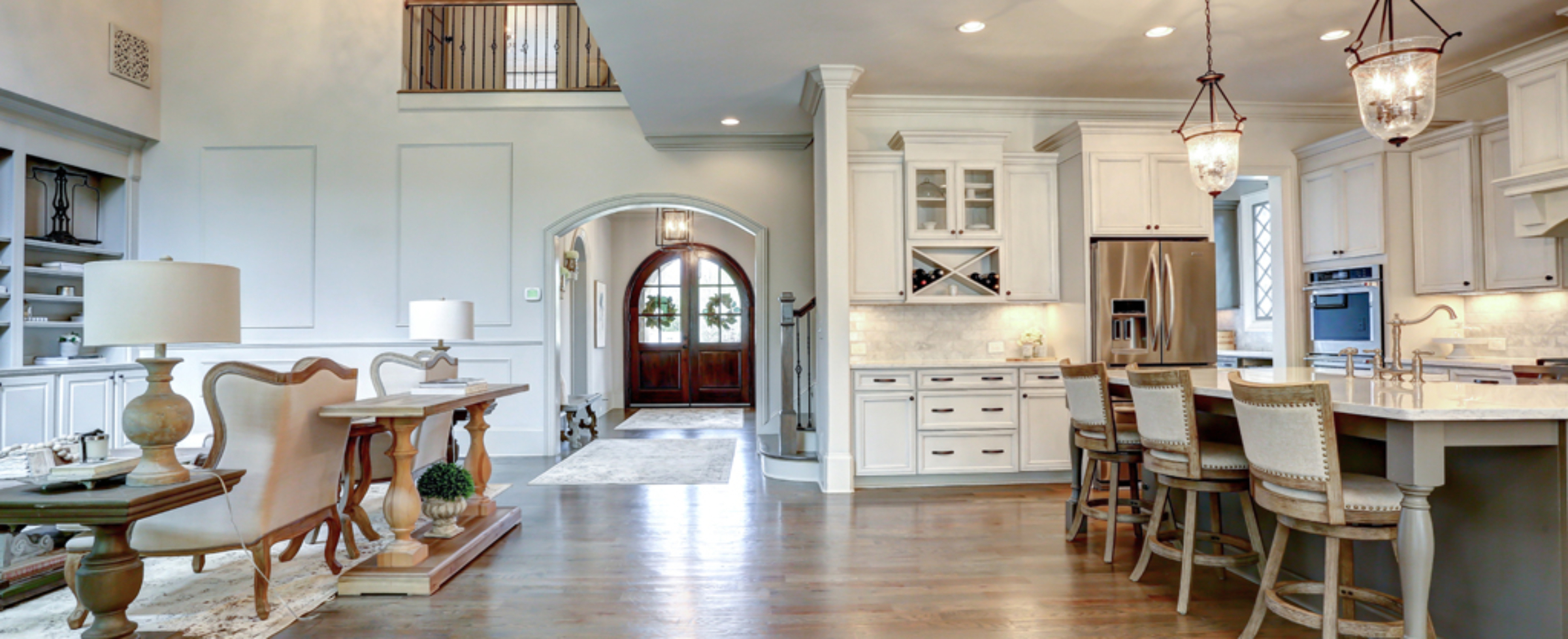 french-tudor-kitchen-and arched-foyer